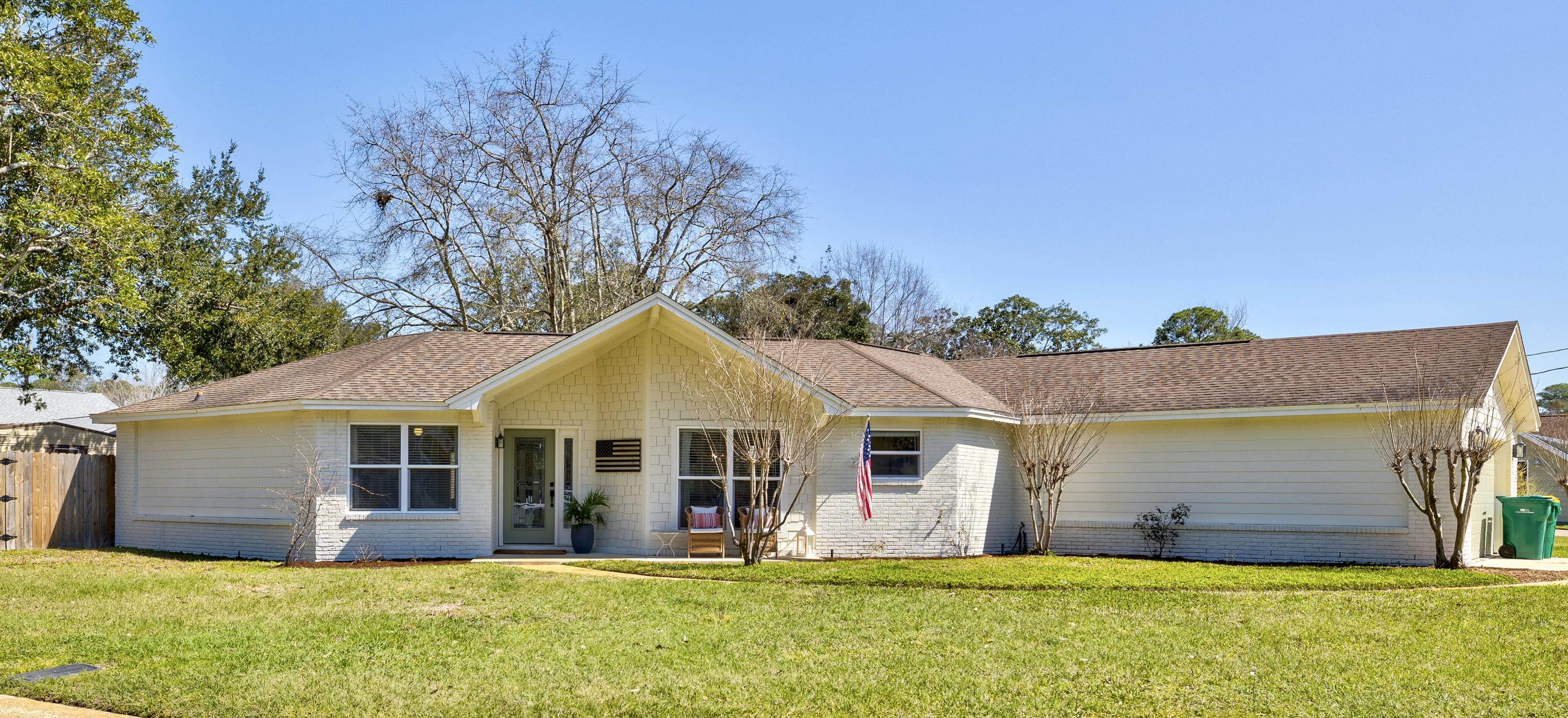 Meticulously maintained, this beautiful 3 bedroom, 2 bathroom, plus office home is perfect for Florida living! An inviting floor plan includes, open living areas with beautiful wood flooring throughout and an abundance of natural light. Kitchen is appointed with granite countertops, tile backsplash and stainless steel appliances, including new refrigerator and gas range. Plenty of storage with pantry and laundry room directly off kitchen. The large master suite, with access to the back patio, includes an ensuite with double vanity and walk-in closet. Out back, you'll find a fully fenced yard with plenty of entertaining space and large enough to add a pool. Bring your boat or paddle board, home is steps away from water access/boat ramp. BRAND NEW A/C and water heater, installed 2021.