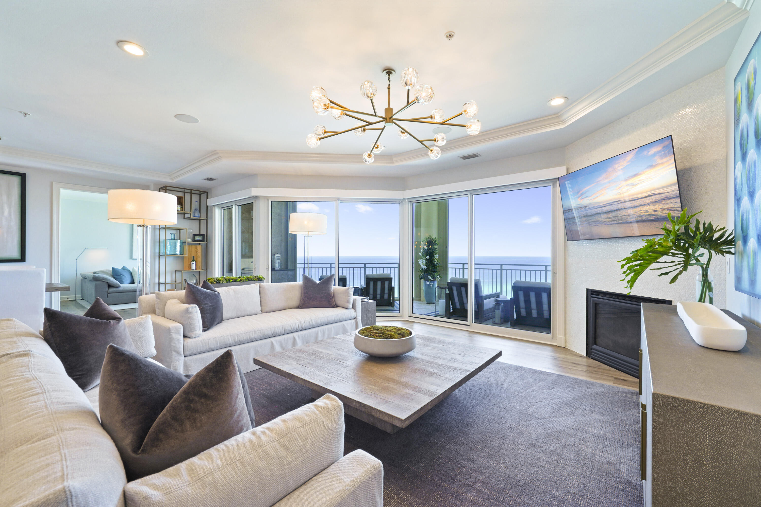 This Villa in Grand Dunes South Tower is perfectly located on the 11th floor, giving it gorgeous, unobstructed views of the emerald green waters of the Gulf of Mexico and the sugar white sands of South Walton. Experience the ultimate beachfront lifestyle in this gorgeous, rental restricted 4 bedroom, 4 bathroom Villa in the heart of Miramar Beach. This stunning Villa offers 2,720 sq. ft. of living space and comes furnished, with select exceptions, allowing you to infuse your personal touch. What makes this unit unique is that all 4 bedrooms have beautiful views of the Gulf and two of the guest bedrooms have views of the Gulf and the Bay! From the moment you step into the unit from your Private Elevator Foyer, you will immediately notice the detail and time that the Sellers have taken to upgrade and bring this gorgeous Villa to life.
Features of this unit include: Anise LVP flooring throughout the entire villa and travertine stone flooring in the baths, "Calcatta Laza" Quartz countertops in the kitchen and guest baths with custom sinks, a ''premium'' stainless steel appliance package which includes a "Kitchenaid" 5 burner natural gas cooktop, double ovens, stainless steel deep kitchen sink, cabinetry with crystal "RH" hardware with soft-close drawers, upgraded light fixtures throughout including a "RH" 60" Boule De Cristal Clear Glass Round Chandelier, flush mount speakers in the living area, 9.5 ceilings with crown molding, ''super quiet'' interior pre-wired for the latest security and audio/visual for home entertainment, 8' solid wood interior doors leading to the Primary bedroom, a natural gas fireplace with custom Seychelles accent tile and Solar shades in the living area, Primary and Gulf Front Guest with remote controls. The Primary bedroom features tray and coffered ceilings adorned with a "RH" Halo Chandelier, a Gulf-front sitting area, and his-and-hers walk-in closets with real wood shelving.The Primary bath offers a separate dual head shower, jetted tub with travertine surround, separate water closet and custom cabinetry.
Step out onto the expansive 11-foot deep Gulf front balcony, where you can begin your day with coffee and stunning water views or unwind with a glass of wine as the sun sets over the horizon 365 days a year. The large Gulf front balcony of this Villa has over 350 sq.ft of space, along with a built-in natural gas grill and all protected by "Hurricane Shutters."
Grand Dunes offers: 24 hour security, gated entry, lush landscaping, 2 levels of gated underground parking for Owners, semi-private elevators leading into the private foyer of your Villa, private heated pools and hot tubs, Owner's Lounge with Fitness Room, Over-Flow Suites for owners and their guests, 200' of deeded beach, Lagoon Style Gulf Front pool and beach service.
"Grand Dunes is the Emerald Coast's Most Desired Rental Restricted Beachfront Development"
Call us today to schedule your private viewing of this gorgeous Villa!