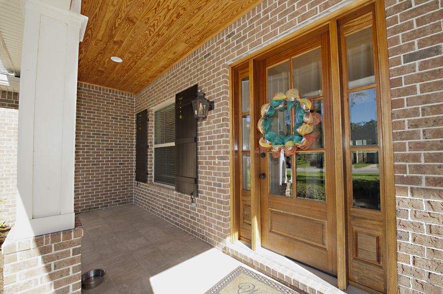 Beautiful constructed home by Key Lime Homes in Magnolia Woods one of the newest subdivisions in Niceville. The moment you drive up to the home you will love the front covered porch with a gas lantern and a stunning solid wood door with beveled glass. The split floor plan offers options for the new homeowner. The entry way to dining room to family room to hallways have hand scraped engineered wood floors. Custom details in the finish work can be seen throughout the home. The custom kitchen with soft close cabinets and drawers. Stainless steel appliances with a gas cook-top range. The counter tops are granite and you have a double door pantry. The breakfast nook and kitchen have tiled floors with an additional closet for storage. Spacious master bedroom with a fabulous en-suite.