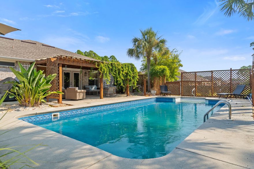 Brewster Pool Home - All Brick Beauty with room behind the fence for RV/Boat Parking Welcome to this all-brick home on a half-acre lot in sought-after Holley by the Sea. From the moment you arrive, the curb appeal stands out--white rock landscaping, hardy bushes, and a welcoming pergola draped with vines, perfect for sipping morning coffee or winding down with an evening glass of wine.An extended driveway with additional concrete offers plenty of parking and secure space behind the fence for your RV or boat. The side-entry garage adds both function and style. Inside, this spacious four-bedroom home plus bonus office is designed with family living in mind. A second living room provides flexibilityideal as a den, playroom, or game spaceand overlooks the sparkling vinyl pool and pergola area. The home is fully furnished (negotiable) and has been lovingly maintained as a second home, making it truly move-in ready.

The backyard is your private retreat, with a well-maintained pool, shaded lounging spaces, and even a shed that conveys with the property.

As a resident of Holley by the Sea, you'll also enjoy resort-style amenities:

3 pools

Fitness center & steam room

Fishing pier & boat launch

Tennis & pickleball courts

And so much more!

All of this is set in one of the prime locations in Navarre, with easy access to Highway 98, top schools, shopping, and diningplus just minutes from the beach, without paying beachside prices.

This attractive price point for a pool home on a half acre is hard to beat. Don't waithomes like this move quickly. Schedule your showing today!
