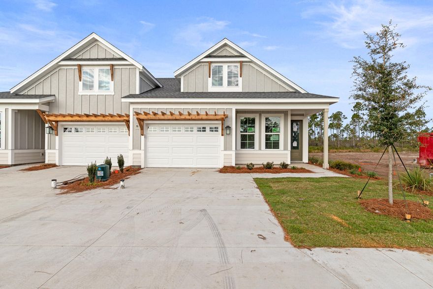 **Seller closing cost incentive for this Market Home**This beautifully designed 2-bedroom, 2-bath paired patio villa with a 1.5-car garage offers low-maintenance, single-level living with modern finishes and an open layout. The Lucas floor plan flows from the foyer into the kitchen, dining, and family room, leading to the covered rear patio with a serene waterview.The upgraded kitchen enhances everyday living with quartz countertops, under-cabinet lighting, a farmhouse sink, soft-close cabinetry and a striking herringbone mosaic tile backsplash. The conveniently located pantry along with an upgraded stainless steel appliance package including a 30inch gas 5-burner cooktop, a vented canopy hood, and a separate built-in 30inch microwave/oven combination, complete the space. The owner's suite includes a spacious bedroom, large walk-in closet, and a private bath with a tiled walk-in shower enhanced with European frameless glass doors, quartz countertop, and raised-height vanities. A secondary bedroom and full bath near the front of the home are ideal for guests or a home office.

Additional highlights include 10' ceilings, 8' doors, luxury vinyl plank flooring, a SmartCode touchscreen entry, and an installed Smart Home package with white glove service. Energy-efficient features include impact-rated windows, LED lighting, and a tankless gas water heater. A family foyer/drop zone and welcoming front porch add everyday convenience.

Estimated completion: January 2026.
Designer selections are available in the Documents tab.

Enjoy effortless living with HOA-covered lawn care and exterior upkeep, plus access to Watersound Origins amenitiesincluding the Origins Golf Course, resort-style pool, sports courts, nature paths, and more.
