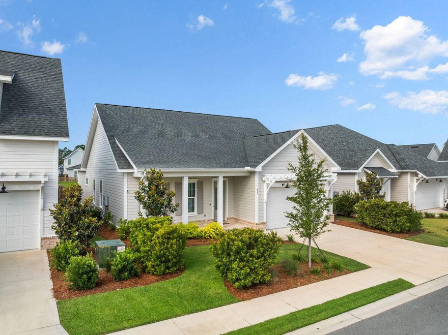 Experience refined coastal living in the thoughtfully designed Bella floor plan located in Watersound Origins. With tasteful upgrades and an serene location backing up to the lake, this single-level retreat is primely positioned nestled in the desirable Longleaf Park neighborhood within the Watersound Origins community. Boasting 3 spacious bedrooms, 2 elegant bathrooms, and a 2-car garage, this open-concept home blends timeless design with upscale finishes to create a home that is as functional as it is beautiful.From the moment you walk in, you're greeted with 10-foot ceilings and 8-foot raised panel doors, all accentuated by luxury vinyl plank flooring that flows throughout the home. The gourmet kitchen is a true centerpiece of this home, featuring sleek quartz countertops, stainless steel Bosch appliances, and an upgraded gas package that includes a dual fuel range, an exhaust vent hood, and tankless water heater. The extended island offers additional storage with 12-inch cabinetry under the overhang and includes a built-in microwave drawer for added convenience. Tiled backsplash, under-cabinet lighting, and soft-close wood cabinetry complete the refined look and feel of this home's unique culinary space.

Every detail in the Bella plan has been curated with comfort and elegance in mind. From melamine closet shelving and custom cabinetry in the laundry room to crown molding, ceiling fans, and recessed lighting throughout, this stunning coastal ranch home delivers both delightful form and function. Each of the bathrooms feature tiled showers and stylish finishes, while the screened back porch with brick laid floors offers a peaceful retreat just off the living room. The backyard comes complete with an outdoor gas stub ready to fire up the grill for entertaining. 

Longleaf Park is ideally located toward the front section of the Watersound Origins community, providing easy access to the ever popular Watersound Town Center. Here you'll find the area's largest Publix, a variety of restaurants, healthcare facilities, and other daily conveniences just moments from your front door.

Watersound Origins is one of South Walton's most desired communities, known for its exceptional amenities and natural beauty. Residents enjoy access to the Village Commons pool (seasonally heated for year round enjoyment), fitness center, multiple sports courts for tennis and pickleball, miles of serene nature trails, unlimited golf, and abundant green space for recreation and play.

Whether you're searching for a full-time residence or a luxurious second home, the Bella plan in Origins offers a perfect blend of coastal elegance, thoughtful design, and a vibrant community lifestyle. Don't miss this opportunity to live in one of South Walton's premier neighborhoods! Buyer to verify all dimensions. Home is currently occupied and will be available for showings starting June 2nd. 

