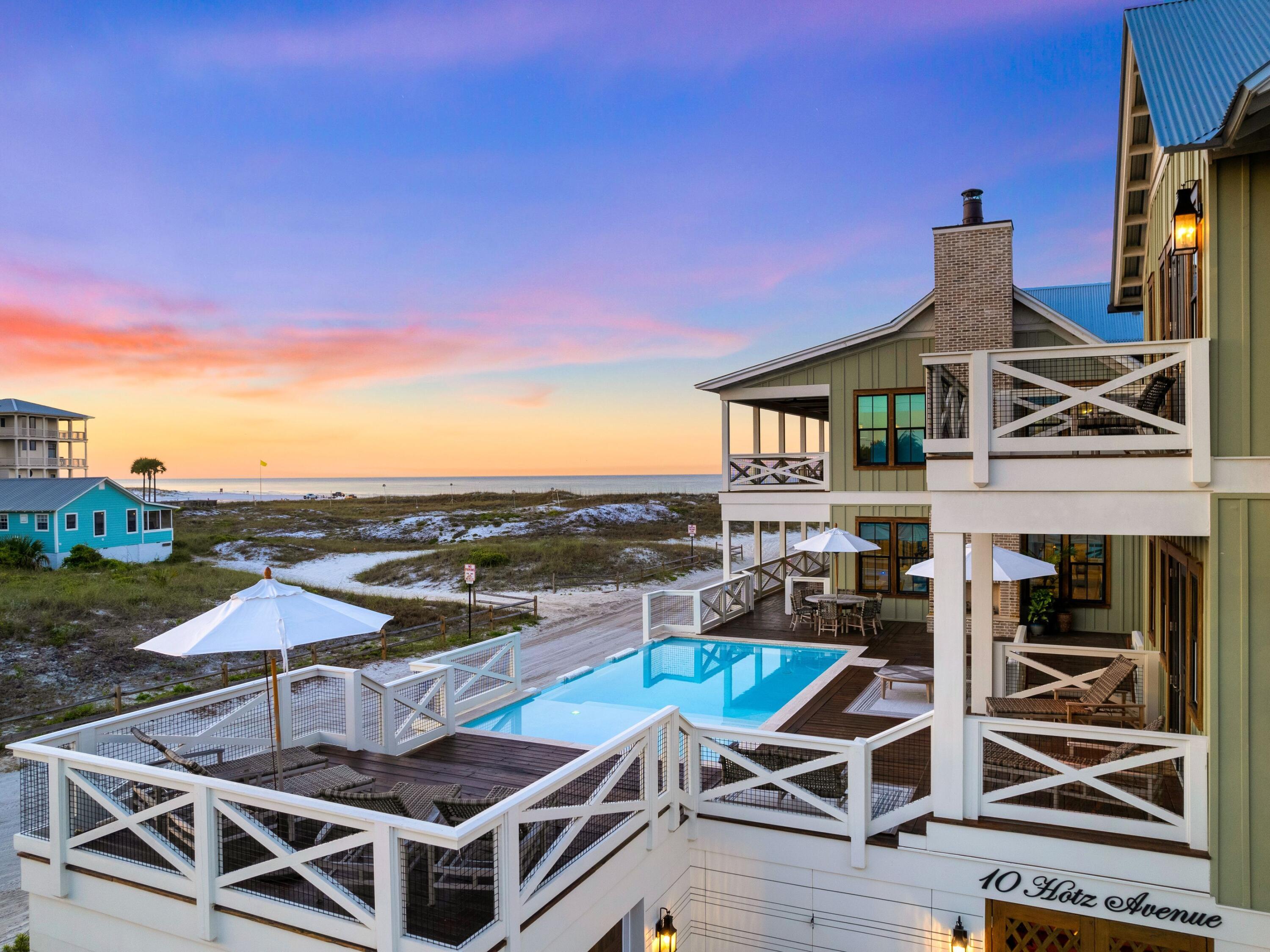 A harmonious fusion of historical significance and modern elements found in a new build, ''The Grayton House'' embodies everything quintessential about the charming beach community in which it resides. Originally built in 1895 by McCaskill Lumber Company, the historic home has seen many facelifts throughout its time on iconic Hotz Avenue until its full potential was realized by bespoke builder Daniel Brock in 2022. Modern-day comforts permeate the seven-bedroom, eight-and-a-half-bath home, starting with the security of a compound-style courtyard system, heated and cooled four-car-plus-golf-cart garage, and second-story private pool overlooking protected Grayton Beach State Park and the Gulf of Mexico.