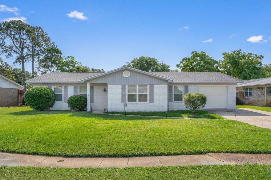 Renovated Gem Just Minutes from the Beach - NO HOA!This 1976-built home has been thoughtfully updated and is completely turn-key. Inside you'll find granite countertops in the kitchen and bathroom, wall-to-wall tile flooring, and a custom wet bar that also makes for a perfect coffee bar or beverage station. The kitchen features stainless steel appliances and French doors that open to a lush, newly fenced backyard (2023). Major upgrades include a new roof and windows in 2017 and HVAC system installed in January 2019. The home includes gas water heating, copper wiring, and best of all--NO HOA restrictions or fees! Ideally located less than 5 minutes to shopping and dining, and under 5 miles to the beach. Perfect as a first home, vacation getaway, or investment property!