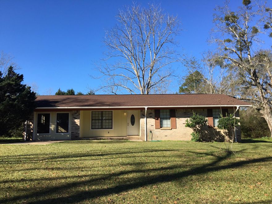 Beautifully remodeled four bedroom brick home set in out in the country. It is far enough away to promise you peace and tranquility, but with an easy drive to town. The interior has been totally remodeled including a new roof, new flooring and fresh paint throughout, new kitchen and even a new master bedroom suite and half bath. New HVAC system to be installed by sellers.The floor plan is amazing with it being both open in the main living areas (living room, kitchen and dining room) and split bedrooms. Oh and it is on one full acre! Don't pass up this home, call for a tour today