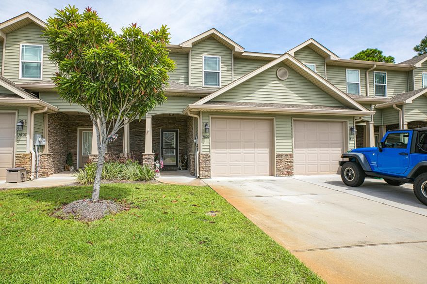Luxury craftsman style townhome built in 2017! This Gorgeous townhome has access to the Santa Rosa Sound and a community pool. It is just a short walk to fish, swim, kayak or just relax in the water. This townhome is one of the few that has a covered back porch, fenced in backyard, new bamboo flooring in bedrooms & NO CARPET . This home features 3 bedrooms, 2 full baths and 1 half bath for your guest. There is tile flooring throughout the main living areas, kitchen and bathrooms. The bedrooms feature new flooring and the best part about this home. You will love the open floor concept where you can enjoy cooking and entertaining with everyone. The kitchen has beautiful upgraded cabinets that are soft close and granite countertops throughout the home. The crown molding throughout adds a beautiful touch! The location is amazing. It is right across the street from a new grocery store and just a five minute walk to restaurants! Schedule your appointment today, before it is too late!

