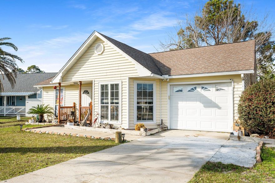 Nestled on the quiet East end of Panama City Beach, this charming 3-bedroom, 2-bathroom beach cottage feels like home from the moment you step in. The laid-back, coastal vibe makes it the perfect getaway or year-round residence. Inside, you'll find an open, airy living space with plenty of natural light. The living room flows effortlessly into the dining and kitchen areas, creating a comfortable space to relax or entertain. Whether you're whipping up a meal in the kitchen or lounging after a day in the sun, this home has everything you need. Outside, the large backyard gives you plenty of room to stretch out, while the spacious rear deck is ideal for enjoying warm evenings or starting your day with a cup of coffee. With a 1-car garage, you'll have space for your vehicle or extra storage, plus the convenience of a circle of homes with just one entrancegiving you added privacy. Located just minutes from the bridge, the local college, and beautiful State Park, you'll have easy access to all the best Panama City Beach has to offer. This cozy home is ready for you to make it your ownwhether you're looking for a peaceful full-time residence, a vacation retreat, or a great investment.