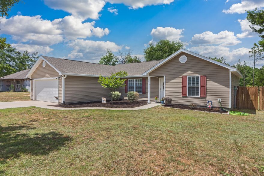 BACK ON MARKET at no fault of the sellers! Don't miss out on this well maintained 3 Bedroom home situated on almost a full acre! This house was built in 2016 and has been exceptionally cared for. As you enter this home, you will be welcomed by an open concept, vaulted ceilings, and beautiful LVP flooring, that has just been updated throughout. This house also offers a split bedroom floorplan with the master bedroom off of the righthand side, and the two additional bedrooms located off of the 2 car garage. The Master Bedroom features recessed lighting, trayed ceilings and a spacious en-suite master bathroom. The bathroom features a double vanity, a tiled walk-in shower, and a large walk-in closet. Head back into the living area, this open concept into the