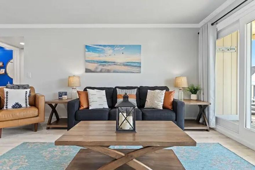 NEW & A RENTAL MACHINE!  Approx. Gross for 2023 was $53K!!!. Everything remodeled early 2022, all new furniture, sofa sleeper, stainless steel appliances, recess lighting, granite countertops, very large extended deck overlooking the canal, all new interior doors, new exterior front door , all new LVP flooring throughout, new bathroom vanity, new porcelain tub, shiplap, makeup vanity area with quartz countertop and UNIQUE BUNK ROOM!  New water heater March 2022. PLUS Unit NEW hurricane impact windows and sliders that were installed May 2023!