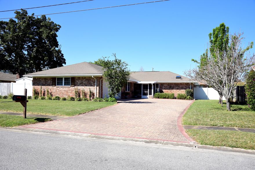 Beautifully remodeled 4 bedroom, all brick POOL home features two living areas plus Florida Room. Kitchen has gas range, stainless appliances, granite countertops, and plenty of cabinets. Seller has removed ALL popcorn from ceilings and recently remodeled 2nd bath. Home also features brick paver driveway, hurricane rated windows and doors, fruit trees, lots of cabinets and storage in the garage, fireplace in the family room, and a beautiful gunite pool in back yard to enjoy those crazy, lazy days of summer! Home warranty provided.