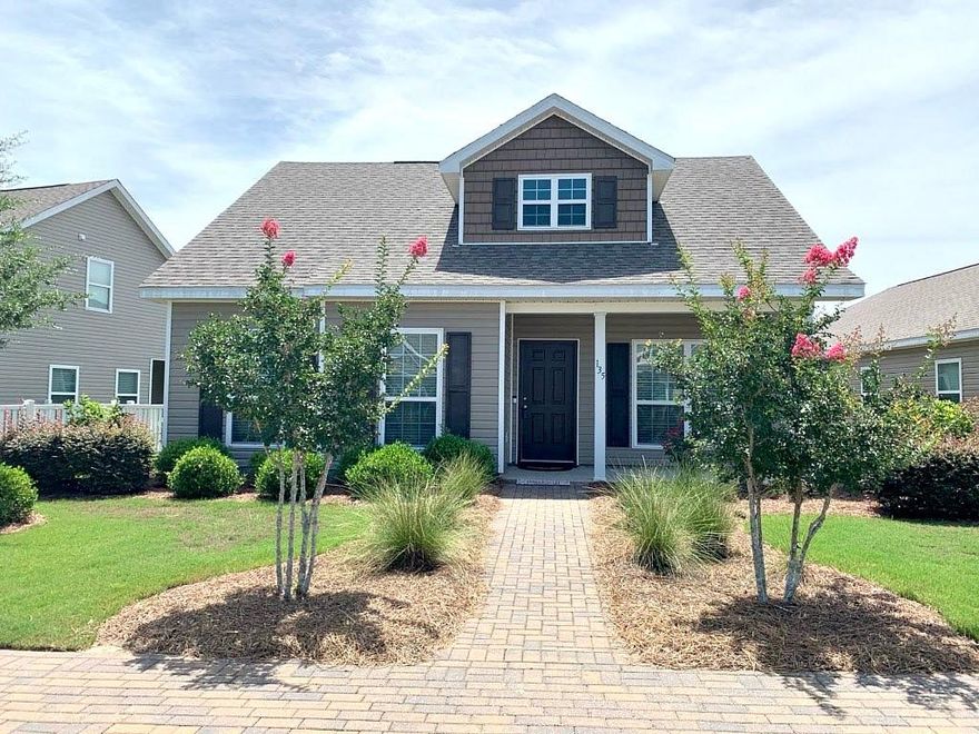 There's no place like home and this warm and friendly home is on nice quiet street in highly desirable Hammock Bay. This home comes complete with large living area, welcoming kitchen and separate dining area, laundry room, and screened porch. Lawn maintenance is included and you're close to the pool, fitness center, tennis courts, and sports complex. This is a wonderful place for families to live. Go across the 331 Bridge and you're just minutes from the scenic beaches of 30A. This is a great place to live...and it's affordable!