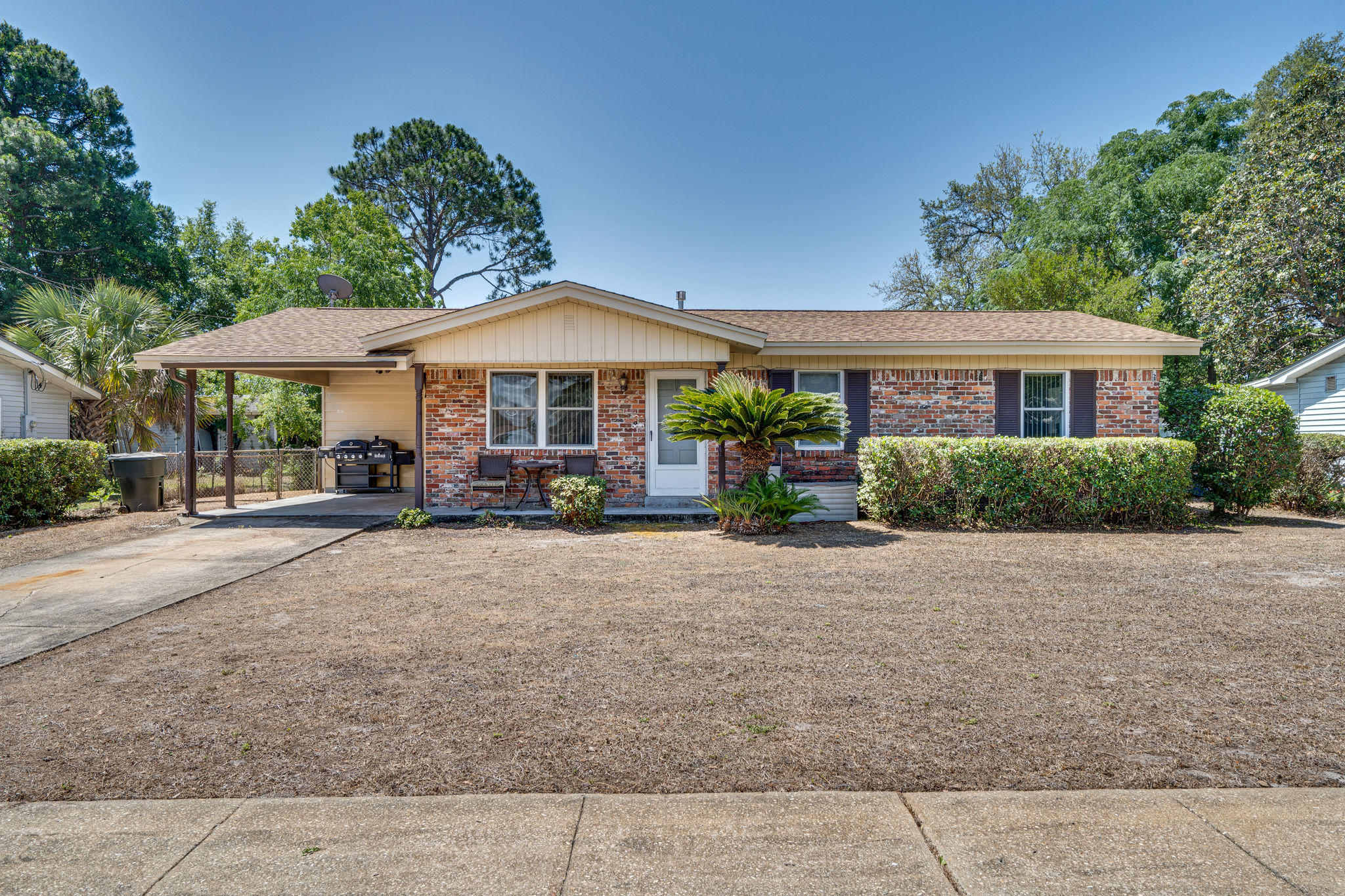 UPDATED and WELL-MAINTAINED brick home conveniently located close to Hurlburt Field, Publix, Santa Rosa Mall, schools and beaches. Walls, doors, pantry, closets, and kitchen cabinets were freshly painted less than a year ago. Recently installed Water Filtration System and Tankless Water Heater! The Storm Windows were replaced in 2010. NEW door hinges, laundry room shelves, LED lamps, quick set locks and high end faucets! The NEW thick 30 millimeter LUXURY VINYL FLOORS are waterproof and pet proof. The home offers two generously sized bedrooms and a master bedroom. Both bathrooms were recently renovated and have beautiful light fixtures, counter tops, and vanities. The master bathroom has a new granite countertop and freshly painted paneling. The kitchen has GE and Kitchen Ai