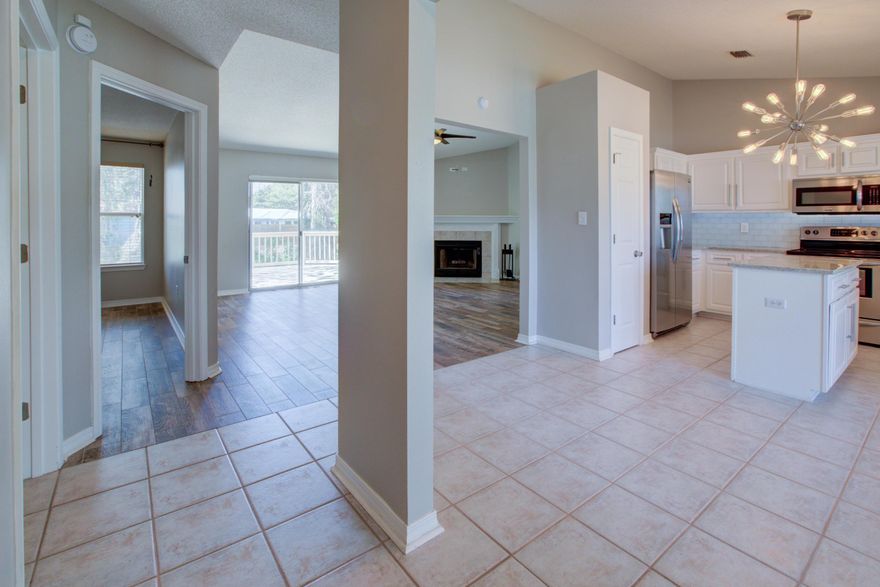 Meticulous and move-in ready! This 3 bedroom West Destin home is tucked away in the highly sought after Harbor Breeze neighborhood on over a 1/4 acre lot. Peaceful residential area yet close to shopping, beaches, restaurants and the booming Destin Harbor. Numerous upgrades have been made and it truly a turn key home awaiting its new owners. Upgrades include wood-look tile throughout, granite countertops in the kitchen and bathrooms, stainless steel kitchen appliances, beautiful kitchen back-splash, custom hardware on kitchen cabinets, upgraded lights and plumbing fixtures, new ceiling fans, and storm doors. A/C compressor replaced in 2017, new garage door opener in 2016, completely fenced in backyard - the list goes on. There is no other upgraded home like this in Destin!