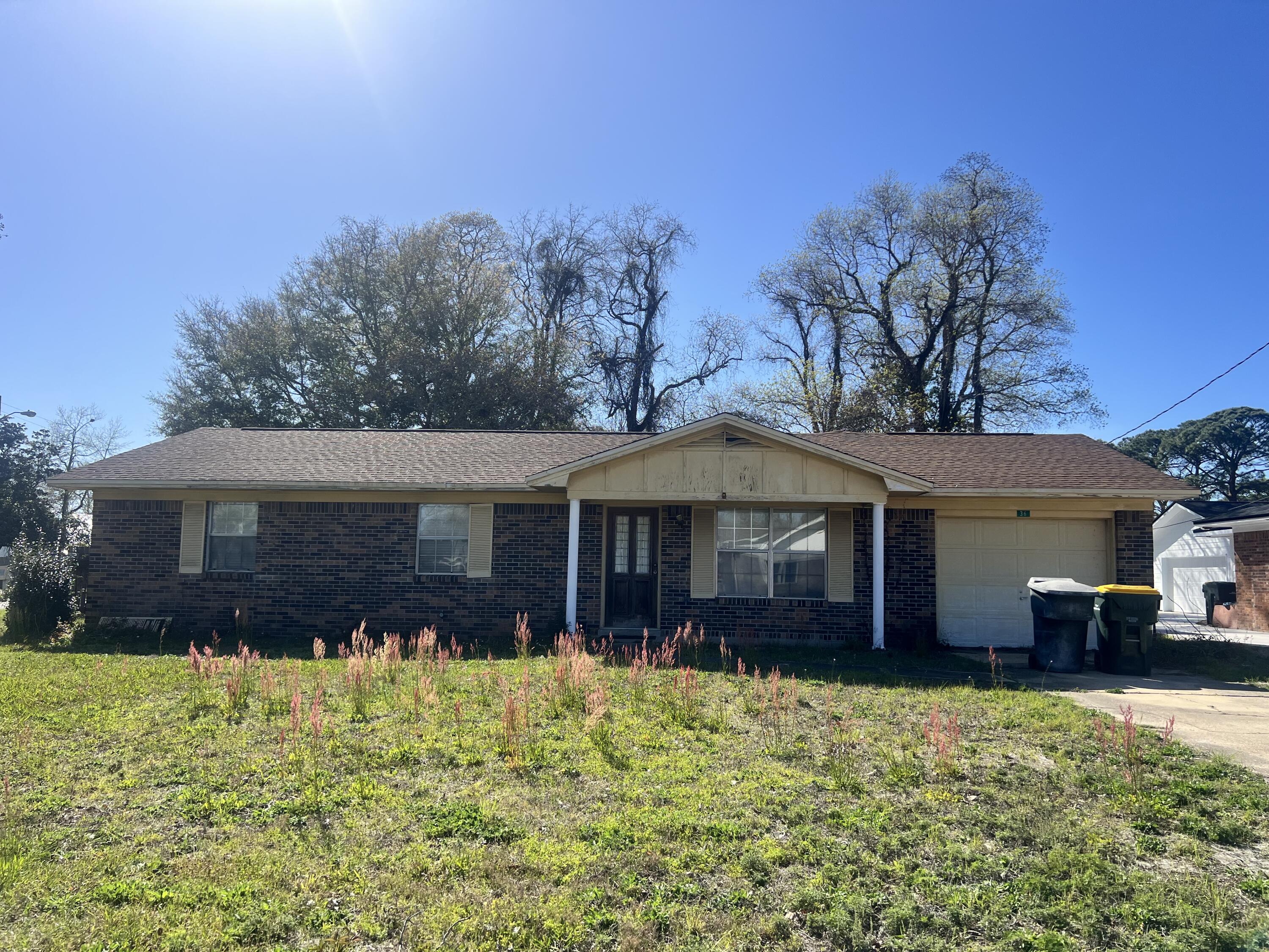 Investment oppurtunity! This home is located on a corner lot in Fort Walton Beach. This 3 bedroom, 2 bathroom home has a one car garage. There are 2 living rooms with the kitchen located between them perfect for entertaining. Once you open the door and walk into the home you will see the potential in this home. The home is in need of repairs.