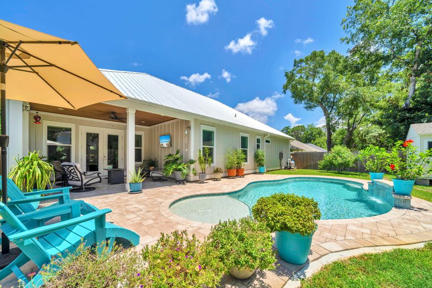 Desirable neighborhood for living with pool! One story open floor plan with an attached 2 car garage & large storage shed. This 3 bedroom and 3.5 bath spacious home offers beautiful finishes such as solid wood shaker style cabinets, quartz counter tops, shiplap walls, walk in pantry and a large mudroom/laundry off the garage. The master bath includes a double vanity, large shower, and leads to a large 13x11 walk in closet. Each additional bedroom has its own full baths and walk in closet. 10ft ceilings, 8ft doors, crown molding, foam insulation in attic, fenced back yard, plenty of storage and covered front and back porches with stained wood ceilings & TV.  Nice landscaping w/fruit trees, shed is finished with sheetrock & can be cooled w/AC mini-split as electric has been installed! Seller is a licensed real estate agent in FL.