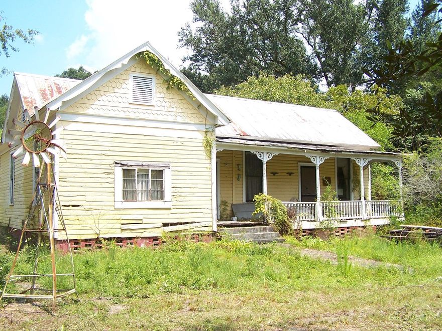 This is an opportunity to own a piece of history. This diamond in the rough is located just outside the city limits, a Victorian style home waiting for a new owner to bring her back to life. Originally recorded as a home built in 1935 and there have been a few additions. The main body of the home features two large bedrooms, an enormous kitchen, and a comfortable sized living room. There is access to the attic with potential to be built out as a second floor with some creativity. The body of the home is extrealy sturdy, both porches need to be rebuilt and and both bathrooms as well as the kitchen need updating. This home has a ton of potential for the right buyer. Situated on nearly 2 acres, with 4 outbuildings, this property is a true piece of history.