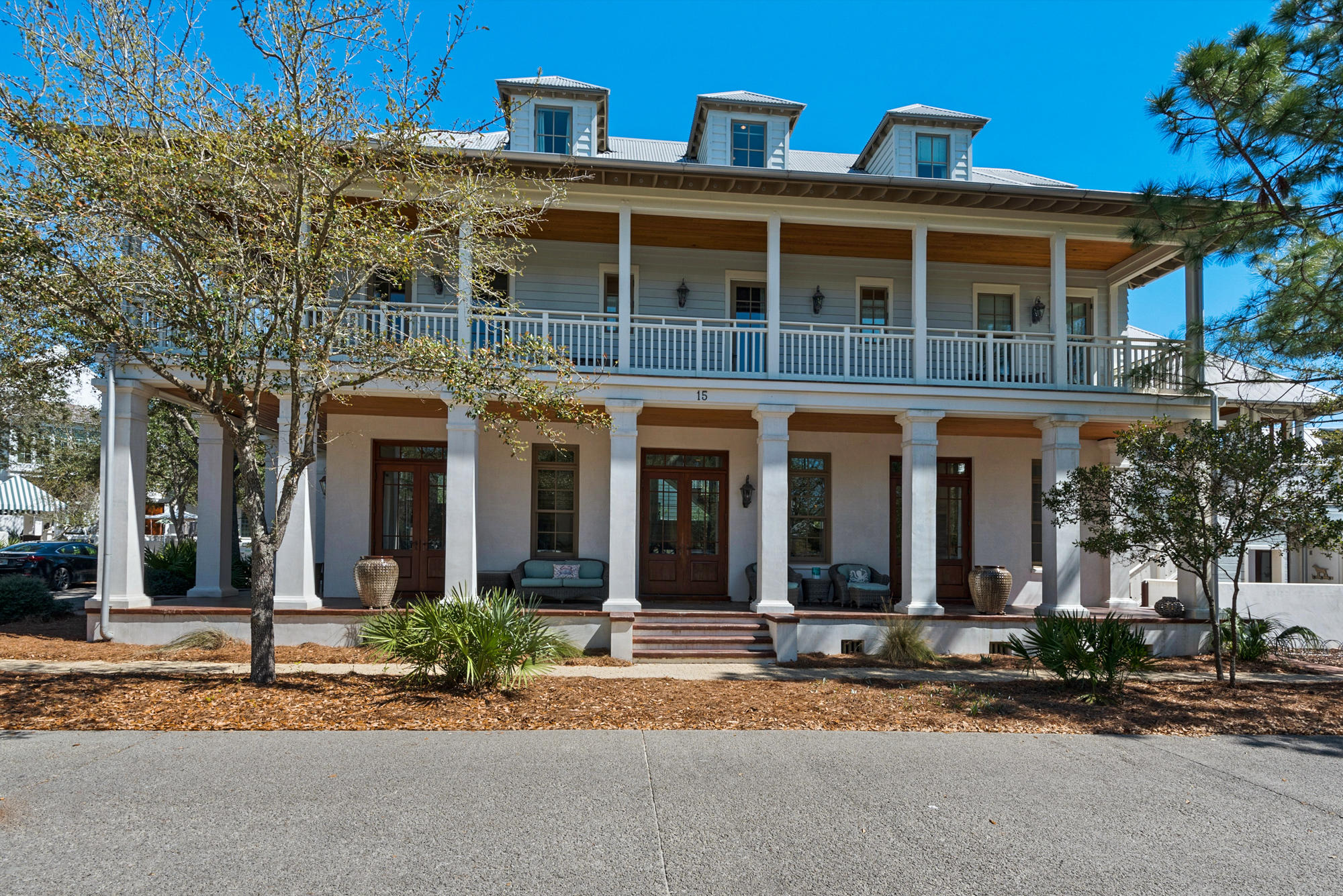 The perfect location on the north side in Rosemary Beach. Freshly upgraded and ready to enjoy, it exudes a great energy from the moment one walks onto the wrap around porch. The first floor encompasses all one needs for the perfect apres beach party. The kitchen and living area create the perfect spot for entertaining. Fabulously designed, the home features large windows that create an abundance of light throughout. The second floor features the master suite, complete with it's own covered porch, perfect for that morning coffee. Two other bedrooms are located on this floor, both with access to the covered deck. The third floor features two additional bedrooms, both with built-in sleeping nooks.The two car garage is topped with a large, open air porch, perfect for enjoying breezy evenings.