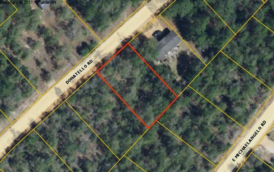 Nice lot in growing subdivision. Wooded with nice trees. Power and water available nearby. Close to town. Level lot. Mobile homes are allowed.