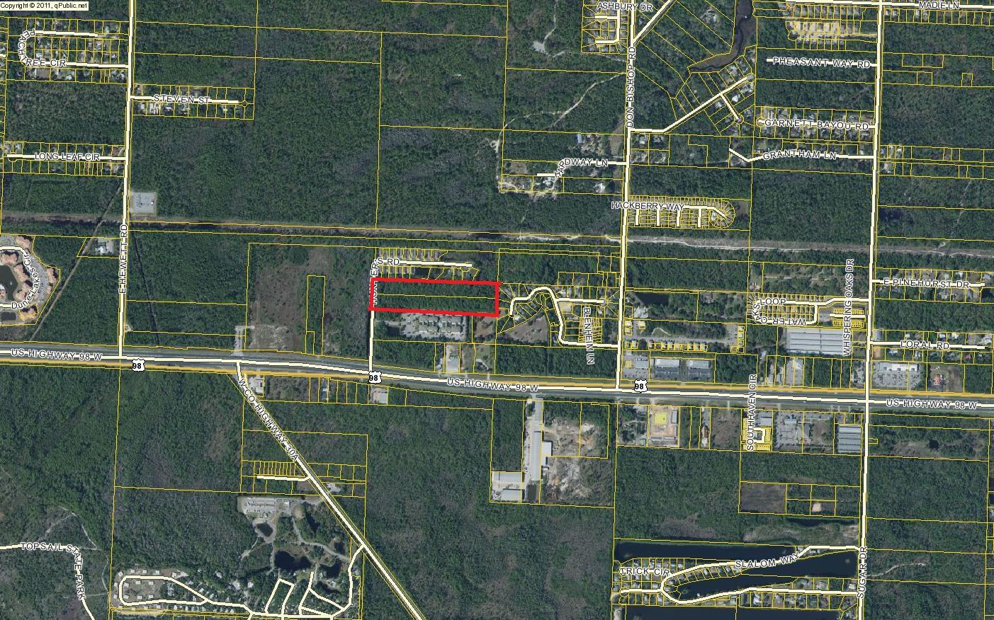10 Acres with recent zoning change to Low Density Residential. 7 acres of uplands, approx 3 acres wetland (on the perimeter of property). Have applied to get wetlands permit. Just far enough off 98 to feel private but close enough to easily access beach, hospital, schools, shopping and dining. Current survey with wetland delineation, Environmental Assessment report and subdivision mock ups. FL RE Agent has interest in property.