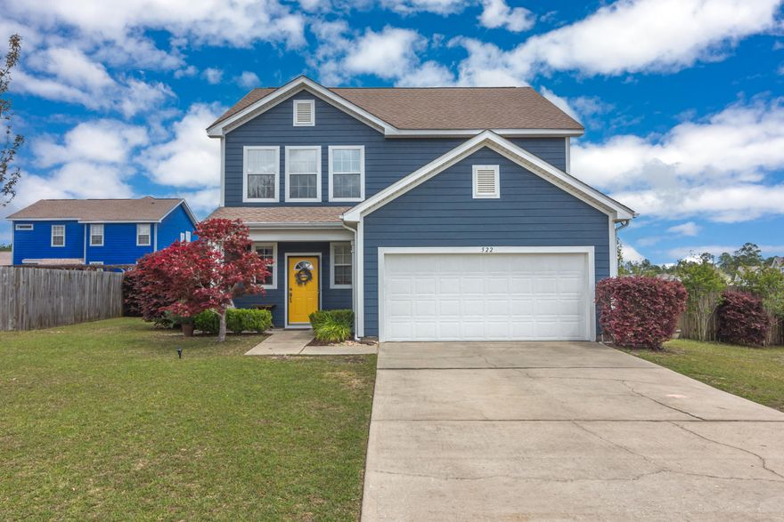 A house you will be glad to call home! Pull up to a stunning new exterior paint job and park in your large 2 car garage. Walk in the front door and enjoy the open floor plan that boasts a large living room, half bath, a formal dining area, breakfast bar and kitchen with newly painted cabinets! There are plenty of windows that allow the a bright feeling in the home along with being able to watch the backyard at all times. The kitchen also includes a built in desk that makes working or tutoring from home extremely convenient! When you walk upstairs, you will find all 4 bedrooms, the laundry area and 2 full bathrooms. The master features beautiful treyed ceilings, a large ensuite with a separate tub and walk in closet! Spend time relaxing on your open back patio in your fully fenced in yard.