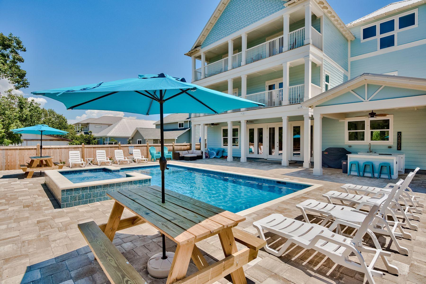 Excellent opportunity to enjoy this exceptional new construction set amongst the naturalistic backdrop of the white sand beaches and emerald green waters of the Emerald Coast. Located two blocks from the beach, this extraordinary nine bedroom home is offered turnkey and rental ready with over $250,000 in gross annual projected income. Thoughtfully designed and masterfully built, this beautiful beachside retreat spans three vertical stories and is highlighted by its coastal architectural aesthetic utilizing low maintenance, sustainable building products including hardi-plank siding and metal roofing.