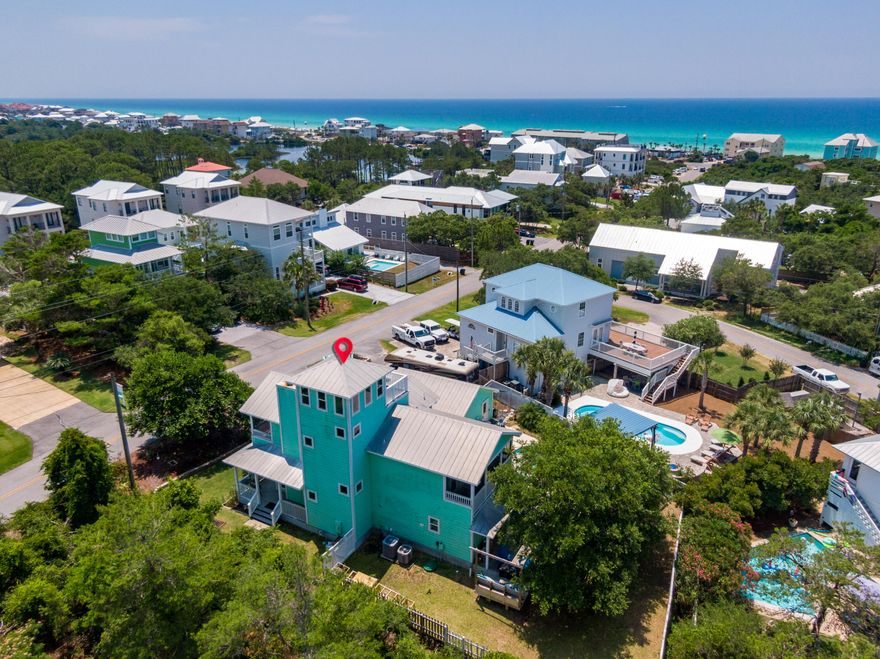 185 Hilltop Drive in Santa Rosa Beach, Florida is located just two blocks off of Scenic Highway 30-A with excellent beach access and tons of wonderful attractions nearby. This home sits on a generous lot with it's own private pool and features beautiful gulf views from the top deck! The house has 3 full bedrooms and 3 full bathrooms with a main floor living/kitchen/dining area and wraparound front porch. The 2nd floor affords the master bedroom and guest bedroom both with en-suite baths and their own private, screened in balcony. The 3rd floor 'lookout tower' has a nice area for sitting indoors or step out on to a good sized deck and feast your eyes on the gulf from this elevation nearly 60 feet above sea level.