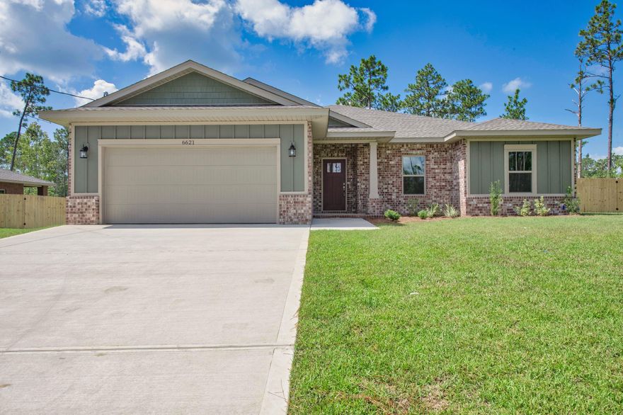 No Wetlands & Located in an X flood zone, this exceptional new home features many upgrades throughout. Clad with the timeless durability of brick, cement fiber board accents, and an architectural shingled roof. Interior offers luxury vinyl plank in the common areas, visually pleasing neutral tile in the baths and laundry room, and carpet in the bedrooms. Custom paint color is accented with a wide baseboard, beautiful crown molding, and spectacular tray ceiling accents in the master bedroom, dining and entry area. Transom windows over the hall entryways provide a high-end custom touch. Stainless steel appliances including refrigerator, stunning shaker style cabinets, and granite throughout finish the home exquisitely.
