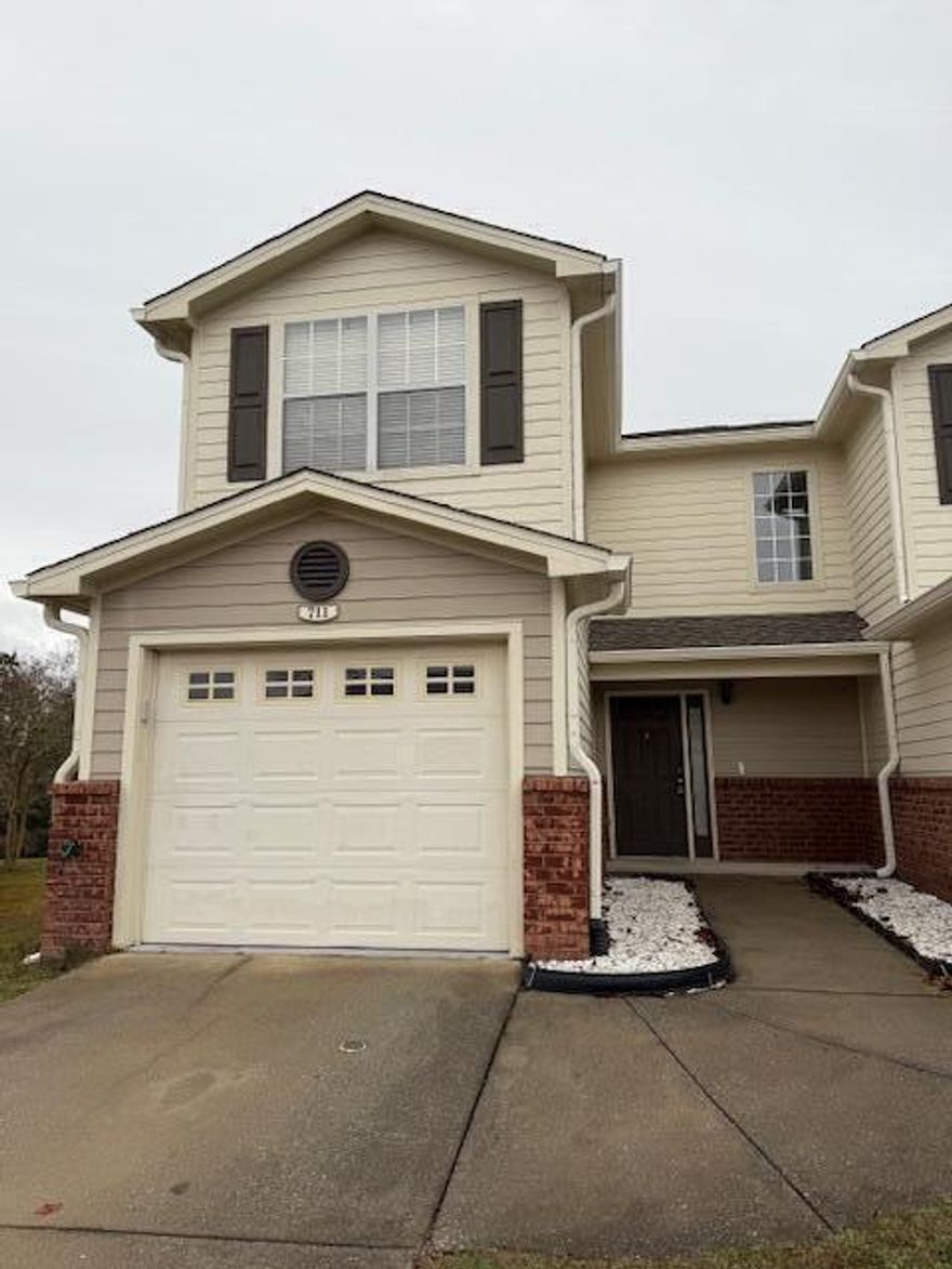 Updated end-unit townhome in Eagles Landing with a new roof, new water heater, and 2022 HVAC. Located in Southwest Crestview, this home sits near extra paved parking and is just steps from the community pool and playground. The back patio offers a private outdoor space overlooking a green area that slopes toward the retention pond. Inside, enjoy newly installed LVP flooring in the living and dining areas, along with a functional kitchen featuring ample counter space and cabinetry. A great opportunity in a convenient location.