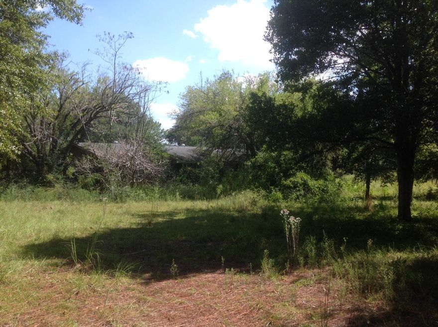 BRING OFFERS! 6.64 ACRES and a Fixer Upper! INVESTORS, BUILDERS TO THE FRONT. Could build a few homes on this Acreage, put Mobile Homes or fix the Home and enjoy the Acreage. Home will need a complete makeover. Barn in back built in 1995. Gated access from Tansey and around the corner as well. Many possibilities here! Call Today!