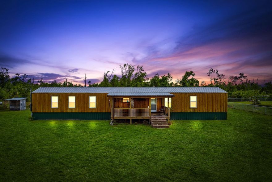 Welcome to 6806 Oakenshaw Dr, a newly remodeled home consisting of over 1200 sq ft of spacious living area that includes 4 bedrooms and 2 bathrooms.  If you are looking for privacy, this home is located on over an acre of land.  Recent updates include a new kitchen with custom cabinetry and gorgeous stainless-steel appliances, luxury vinyl plank flooring, exterior siding, and roof (permit pulled in 2019).  Head outside and you will find a 48x24 pole barn with workshop that was constructed in 2019, a large chicken coop, irrigation for a personal garden, and a custom smokehouse.  Relax on the large, covered front porch and enjoy the views because this home truly feels like a cabin and an outdoorsman's dream! Better yet, flood insurance is not required.  This could be a great first home or