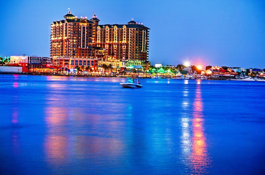 Enjoy watching all the activities at Crab Island from your two private balconies. Sunsets over the Destin Bridge will be something that you and your guests will be able to enjoy year round. This 3 bedroom/3 bathroom condo features an open living plan and boasts a large kitchen with stainless appliances, granite countertops and cherry wood cabinets. The master suite offers a private balcony and large master bath with garden tub and separate shower. Both guest suites have attached bathrooms. Views overlooking the Crab Island and Gulf of Mexico make this a MUST SEE at a price that can't be beat! Owner is selling the condo fully furnished and rental ready. Gross rental income on the books for over $74,000 for 2021.Seller is a licensed broker/salesperson.
