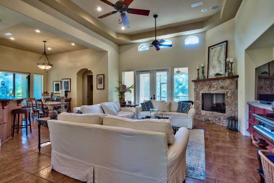 Italian and Southwest inspired estate located in The Preserve at Burnt Pine. You will know this home is special when you enter the large front courtyard which features a beautiful stone fireplace, perfect for outdoor entertaining all year round. This home boasts exquisite and unique details throughout such as solid mahogany doors, Italian porcelain tile flooring, custom fixtures and cabinetry, art niches, and upgraded media wiring. The gourmet kitchen features granite counter tops, tumbled stone back splash, premium stainless steel appliances, and a large breakfast bar. The living room features 19' ceilings, a stone fireplace, and opens up to a large screened porch overlooking the peaceful Preserve. Enjoy a private master suite featuring a large Jacuzzi soaking tub, his and her vanities a tiled massage shower, and an oversized walk-in closet. The guest bedrooms are both spacious and feature en-suite baths. *Pending ARB Approval- There are landscaping possibilities on the left back side of the home. Quoted at $3000, you could add an extra raised "green space" with a paver wall, or Quoted at $48,000, you could add a small pool.* As an added bonus and to introduce the new owners to the Sandestin lifestyle, the listing brokerage and seller(s) are offering an incentive package to the buyer(s) of this property: Golf for four on one of our three championship courses, a pass for four to Sandestin's exclusive Beach Club, and an introductory membership to the Burnt Pine Golf Club. Sandestin Golf and Beach Resort is a major destination for all seasons and all ages, and has been named the #1 resort on Florida's Emerald Coast. This magical 2,400 acre resort, comprised of over 70 unique neighborhoods of condominiums, villas, town homes, and estates. The resort features more than seven miles of beaches and pristine bay front, four championship golf courses, a world-class tennis center with 15 courts, 19 swimming pools, a 113-slip marina, a fully equipped and professionally staffed fitness center and spa, meeting spaces and The Village of Baytowne Wharf, a charming pedestrian village with events, shopping, dining, family entertainment and nightlife. For true golf cart community living, Grand Boulevard is just outside the resort gates and provides access to additional shopping, dining and entertainment Ã¢â‚¬" all without traveling on Hwy. 98. Come to Play, Stay for Life!