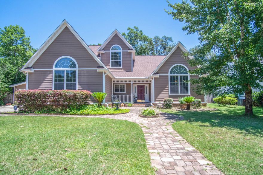 This is a MUST SEE 4 car garage home situated on a private .33 acre lot in the sought after gated community of the Village of Bolton. The home is located on a cul de sac, perfect for community gatherings with reduced traffic. Hardie board siding, a quaint covered front porch leads you into a renovated 4 bedroom home. Downstairs you will enjoy an updated kitchen with granite counters, newer appliances, luxury vinyl flooring, crown molding, cased windows, vaulted ceilings, and an abundance of storage throughout. The master is located downstairs and enjoys a completely renovated master bathroom with a large slipper tub, custom tiled walk-in shower, dual vanity with new plumbing and lighting fixtures and herringbone tile flooring. The living room is carpeted with ample space for oversized