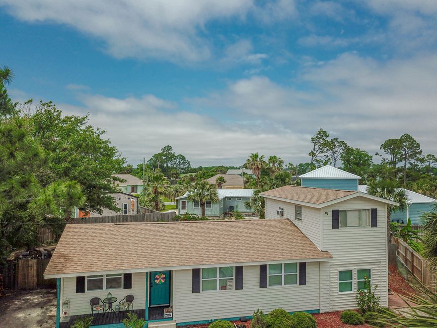 What a wonderful cashflow opportunity in a fabulous location!!! Currently used as a long-term rental property with three - yes, three - rentals. The main part of the home is a 3-bedroom, 1 bath. There are two additional efficiency rentals, one on the main floor plus one on the 2nd floor. This area is zoned for rentals so with a little imagination this would be a fantastic short-term rental property! The over sized backyard is awesome, and the over sized parking facilitates many vehicles and beach toys. With the home being only a few blocks from the public boat ramp (located on Dolphin), as well as a few blocks away from a beach access, this is the ideal location. This far east-end area is known for the wonderful restaurants, the state park, and of course the beautiful Beach.