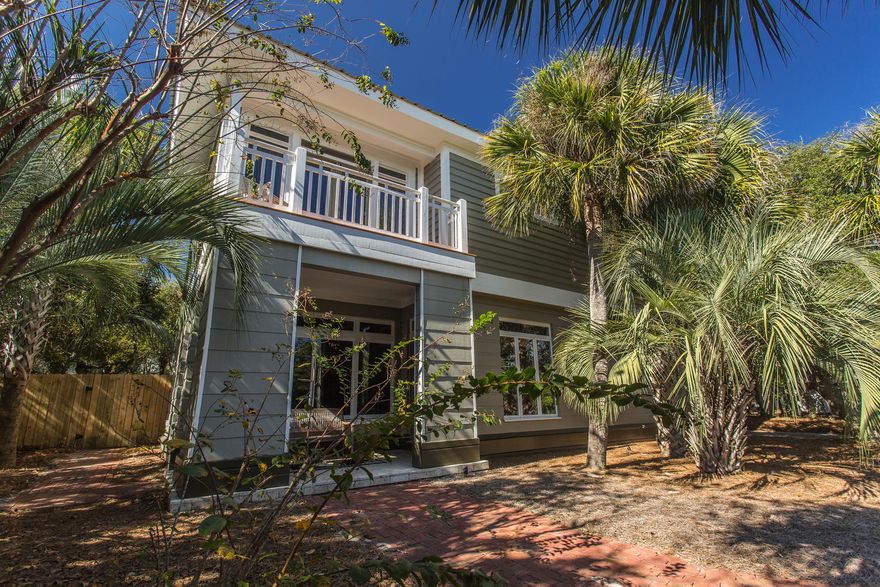 Charming custom built beach house just steps to the beach. Cypress wood throughout the interior & exterior of the house. The only sheetrock on the property are the interior walls of the two car garage. Terrazo floors that were in an original portion of the house still remain today. In 2003, all exterior doors & most windows were replaced. HVAC systems replaced in 2015. Large open kitchen equipped with a Thermador stove, Bosch dishwasher & Sub Zero refrigerator. Beautiful wide plank pine flooring. Wonderful carriage house with a private bedroom, living area, large bathroom, kitchen and washer/dryer hook-up. You will have the luxury of renting the main house and carriage house separately. Large lot with mature trees. Enjoy the pool located between the main house & carriage house.