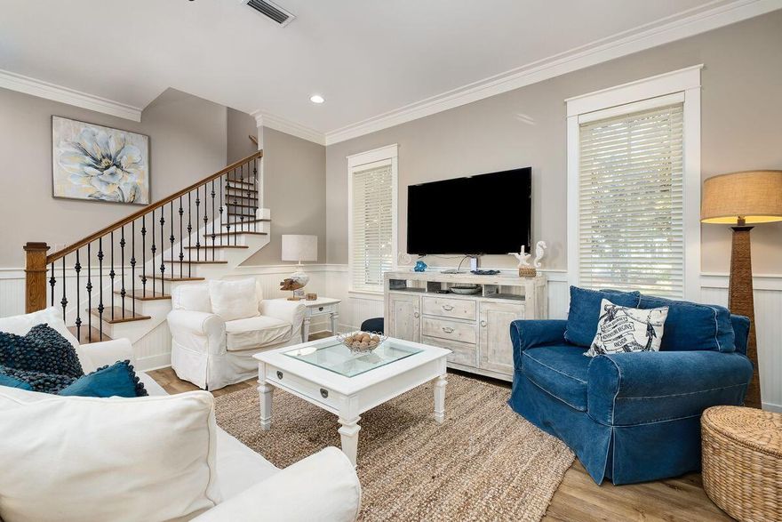 Experience the epitome of Sandestin Golf and Beach Resort living in the coveted Bungalos neighborhood. Whether an investment property, second home or primary residence, this corner lot residence -- one of only four in Bungalos -- offers the ultimate in convenience and luxury. Two golf carts ensure you can explore the resort with ease. Step inside and be greeted by a spacious screened porch, perfect for unwinding after a day of tennis, golf, or beachcombing. The living/dining areas and kitchen beckon with an open layout, graced by 10-ft. ceilings and an abundance of windows, bathing the space in natural light. The master suite, located on the first floor, provides a serene retreat. Upstairs, your guests will relish their private suites, each boasting a full bathroom. Impeccably maintained,