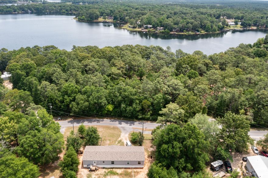 Welcome to your spacious 2021 home and a part of Kings Lake Estates in Defuniak Springs, FL.  This residence offers comfort, style, and modern convenience in every corner.As you step inside, you're greeted by a spacious and inviting living area, perfect for entertaining guests or simply unwinding after a long day. The open floor plan seamlessly connects the living room to the kitchen and dining area, creating a warm and inviting atmosphere for gatherings with loved ones.The kitchen is a chef's delight, ample cabinet space, and great appliances. Whether you're whipping up a quick meal or preparing a feast for a crowd, this kitchen has everything you need. Retreat to the luxurious master suite, complete with a generously sized bedroom, walk-in closet, and ensuite bathroom. The ensuite bathroom features  a dual vanity sinks, providing the ultimate in relaxation and convenience.

Four additional bedrooms offer plenty of space for family members or guests, each thoughtfully designed with comfort and style in mind. Two additional bathrooms ensure that everyone has ample space and privacy to unwind and refresh.

The large fenced in back yard has a storage shed and plenty of room to create your own backyard paradise.  Whether you're hosting a barbecue with friends or simply enjoying your morning coffee, this outdoor space is sure to become a favorite gathering spot.

Located in the sought-after community of Kings Lake Estates, this mobile home offers the perfect blend of privacy and convenience. With easy access to shopping, dining, and outdoor recreation, in this charming neighborhood.

Don't miss your chance to make this mobile home yours. Schedule a showing today and start living the Florida lifestyle you've always dreamed of!   Buyer to verify all important details. 
