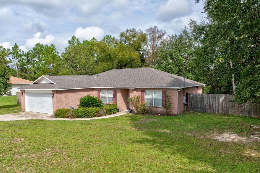 This 4BR/2BA home is convenient to town, 7th SFG, & Eglin AFB. It is just south of I-10 off of PJ Adams. The split floor plan is enhanced with the laminate flooring throughout the entire home, NO CARPET here! The master suite boasts a large master bath complete with a walk-in closet. In the kitchen, you will find a center island, pantry, and ample cabinet space. Outside is fully fenced and features a deck that divides 2 level side yards that are great for entertaining and play; storage shed conveys. Yard backs to greenbelt for privacy. New roof in April of 2019!!