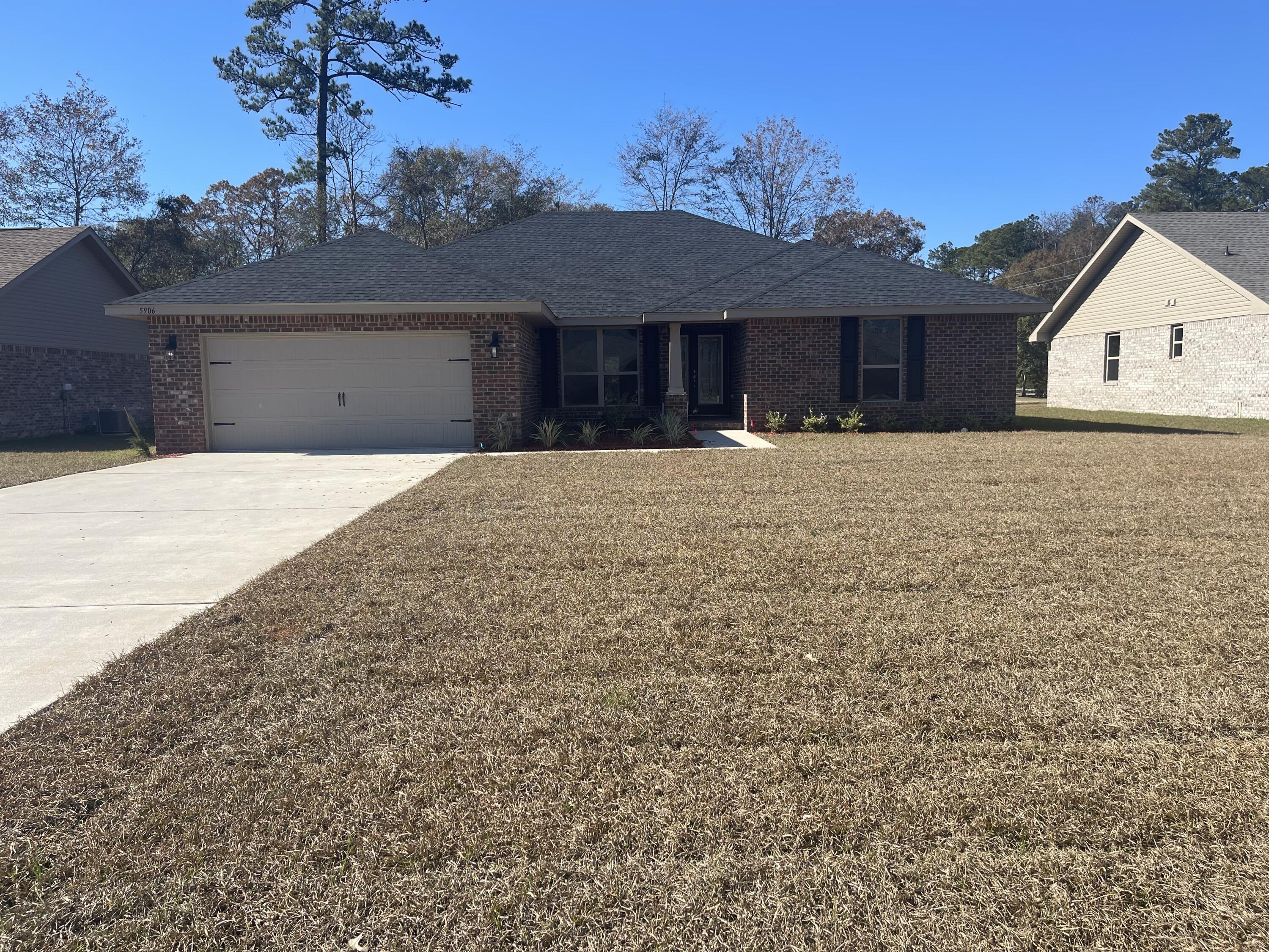 This open floor plan comes with 4 bedrooms and 3 full bathrooms. The kitchen features an island overlooking the family room that has a cathedral ceiling. The family room gives access to the 14' x 16' covered back porch. This is a split bedroom plan. The master bath comes with a large walk in closet, dual vanities, a garden tub and separate walk in shower. All cabinets are solid wood and countertops are granite. Up front coming through the foyer is a spacious den/Office. Bedroom 3 & 4 share a jack and jill bath and bedroom 2 has its own. There is washer/dryer hook up in the laundry room..The home comes with a microwave, dishwasher and smooth top electric range all in stainless steel.This home is 4 sided brick and has an automated garage door opener. Sprinklers are standard.