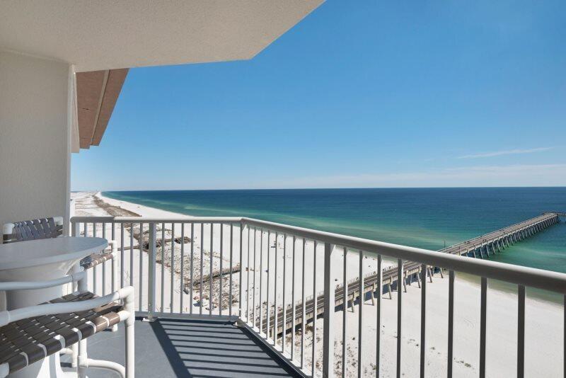 ''Pure Bliss'' sums up this extraordinary Gulf front unit. Perfectly situated on the east corner of the building offering complete unobstructed views of the Gulf of Mexico. This unit sleeps up to six people comfortably. Master bedroom has a king sized bed with flat screen tv, resort-style twin bunk beds and a new queen sleeper sofa. Granite countertops in fully equipped kitchen, updated flooring in the living room with new queen sleeper sofa and chair and a gorgeous, custom designed walk-in tile shower. Spectacular views from the floor to ceiling windows and private balcony. The complex offers 3 swimming pools, exercise facility, hot tubs and 450' of waterfront. Rental history is available upon request.*Please note: Couch and loveseat in pics have been replaced with new couch & chair.