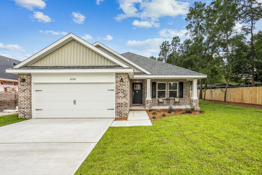 Price Improvement! Welcome to Valhalla's Landing!Discover the highly sought-after Carlos Floorplan in this stunning 3-bedroom, 2-bathroom brick home, designed for modern living with an open and split floor plan. Newly added full privacy fence. Check out the beautiful backyard oasis. Make this yours today!  Featuring vaulted ceilings, crown molding, under-cabinet lighting, and 2'' faux wood blinds, this home offers a perfect blend of style and functionality.The spacious layout seamlessly connects the kitchen, living, and dining areas, making it ideal for entertaining. The chef's kitchen is thoughtfully designed with stainless steel appliances, granite, bar seating, a full pantry, and solid wood soft-close cabinets and drawers, all elegantly detailed with brushed nickel hardware The grand master suite is a true retreat, featuring a spa-like master bathroom complete with a garden tub, a separate all-tiled shower with dual shower heads, double vanities, and two spacious walk-in closets.

Privacy fence to be added to the back of property at no additional cost!
Nestled on a private 1.01-acre lot, this home provides ample space for outdoor activities and relaxation. Whether you envision a garden, an outdoor entertaining space, or simply a quiet retreat, this property offers endless possibilities.

Located in a highly desirable new subdivision south of I-10, just off Hwy 87, this home offers easy access to both Navarre and Milton. Enjoy the convenience of nearby shopping, dining, and entertainment, while being just 20 minutes from the pristine white sands of Navarre Beach.
This home is complete and move-in ready. Don't miss the opportunity to own this beautiful new home!