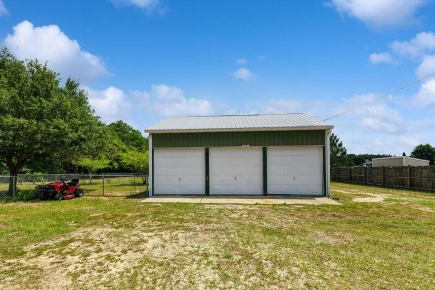 BACK ON MARKET WITH NO FAULT TO SELLER AND LISTED AT APPRASIED VALUE. SELLER IS OFFERING $5,000 TOWARD INTEREST RATE POINT BUY DOWNNEW WATER HEATER INSTALLEDCharming 3BR/2BA Country Home on 1 Acre LOT with 3 garage workshop, Covered Porch & No HOA!Enjoy peaceful country living on a spacious 1-acre lot with this beautifully maintained 3-bedroom, 2-bath home that combines comfort, space, and functionality. Relax or entertain on the covered back porch with extended deck, perfect for gatherings or quiet mornings. Inside, you'll love the comfortable living area.The back portion of the yard is perfect for bonfires or raising chickens, goats, or other small livestock. Additional highlights include a carport, a 3-car garage, and an amazing workshop is perfect for hobbies, projects, storage.

With no HOA restrictions, this property offers the freedom to live the country lifestyle you've been dreaming of all while staying conveniently close to modern amenities.