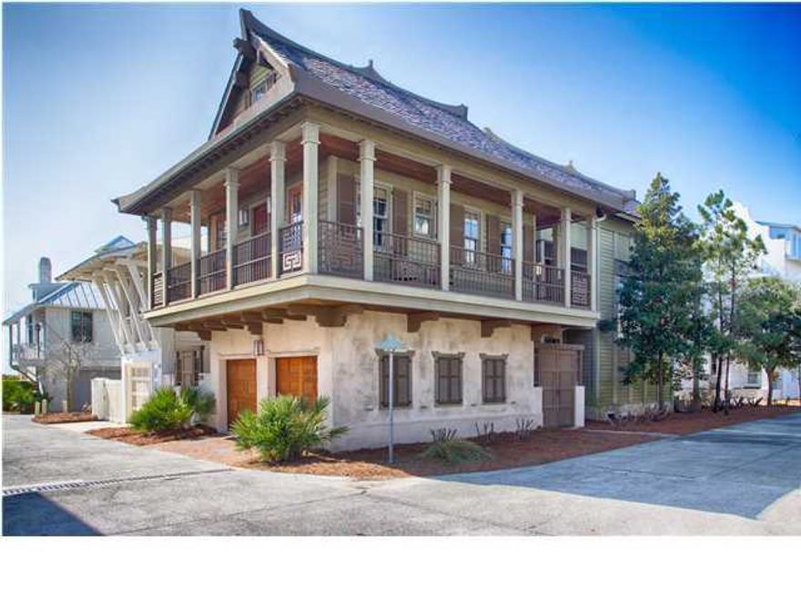 This CUSTOM home is in the PERFECT LOCATION! It is just 3 homes off the BEACH on a BOARDWALK, on a dead-end street, but still parallels ROSEMARY AVENUE and is steps to MAIN STREET and the WESTERN GREEN. There are NO STREETS TO CROSS to get to the BEACH!Enter the front door from the BOARDWALK TO THE BEACH into a foyer where you notice that the interior of this home is almost ALL WOOD from the PECKY CYPRESS CEILINGS, PINE WALLS and RECLAIMED WOOD FLOORS. The first level has travertine floors that are durable and easy to handle the sand's wear & tear. The MASTER SUITE is on the FIRST FLOOR and is adjacent to a PRIVATE COURTYARD between the main home and the CARRIAGE HOUSE above the 2 CAR GARAGE. There are so many details and FABULOUS FIXTURES & UPGRADES throughout the home! The MASTER