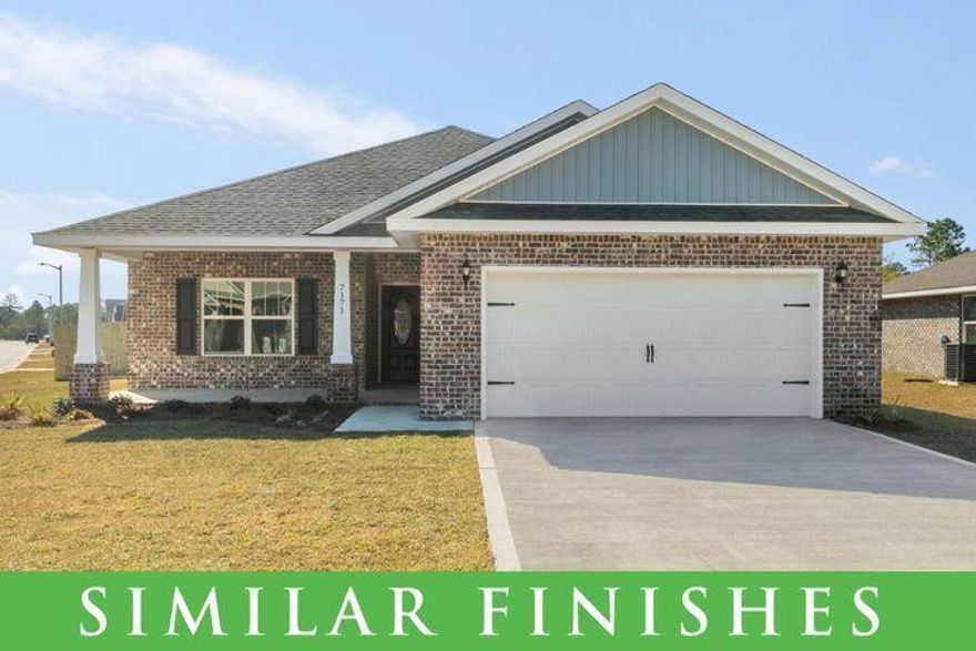 The famous Carlos Plan now building off East Bay in Navarre. This 3 bedroom 2 bath brick home offers exactly what you are looking for. Wide open living room, dining room and kitchen space lined with Luxury Vinyl Plank Flooring. This split floor plan offers a spacious master suite,  a luxurious master bathroom including a separate garden tub, a stand up tile shower & double vanities. The kitchen includes solid wood cabinets with soft close doors & drawers. 3cm Granite in kitchen and bathrooms. High end finishes include vaulted ceilings in the living room & a single trey ceiling in the master bedroom, brushed nickel fixtures, lever style door handles, crown molding in the treys & more!  Photos of a similar home. We do not have any model homes available. Check out the 3D Tour!
