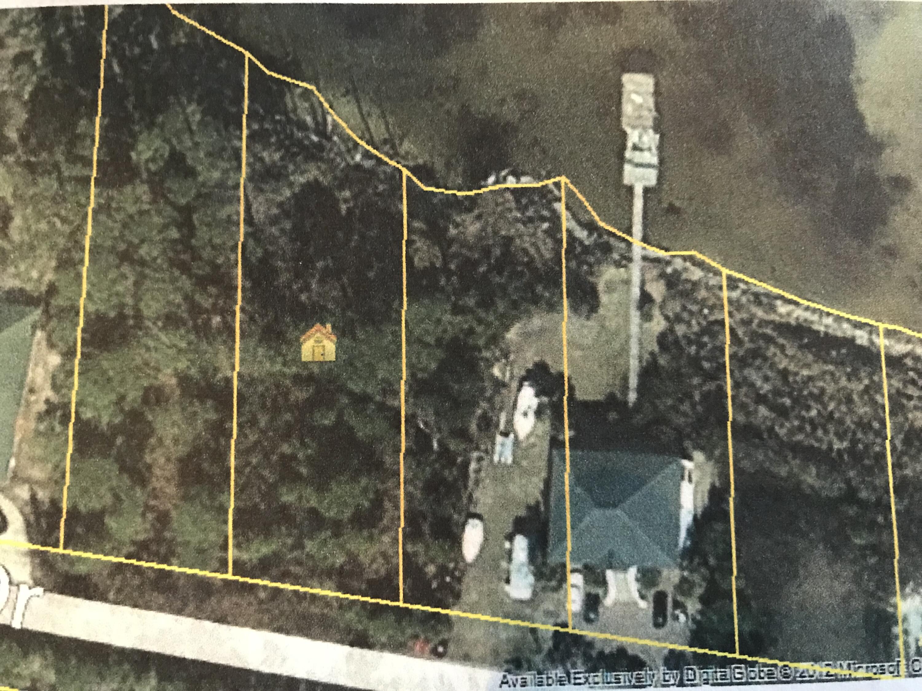 Build your dream home on the bay. This gorgeous bay front home site has no HOA, no restrictions! THis hidden gem of a neighborhood is located behind the Silver Sands Outlet mall, close to shopping, reestaruants and the most beautiful beaches on the Gulf Coast! Make this your piece of paradise! Make an offer today! Buyer to verify all imformation they deem important. Survey and wetlands study available.