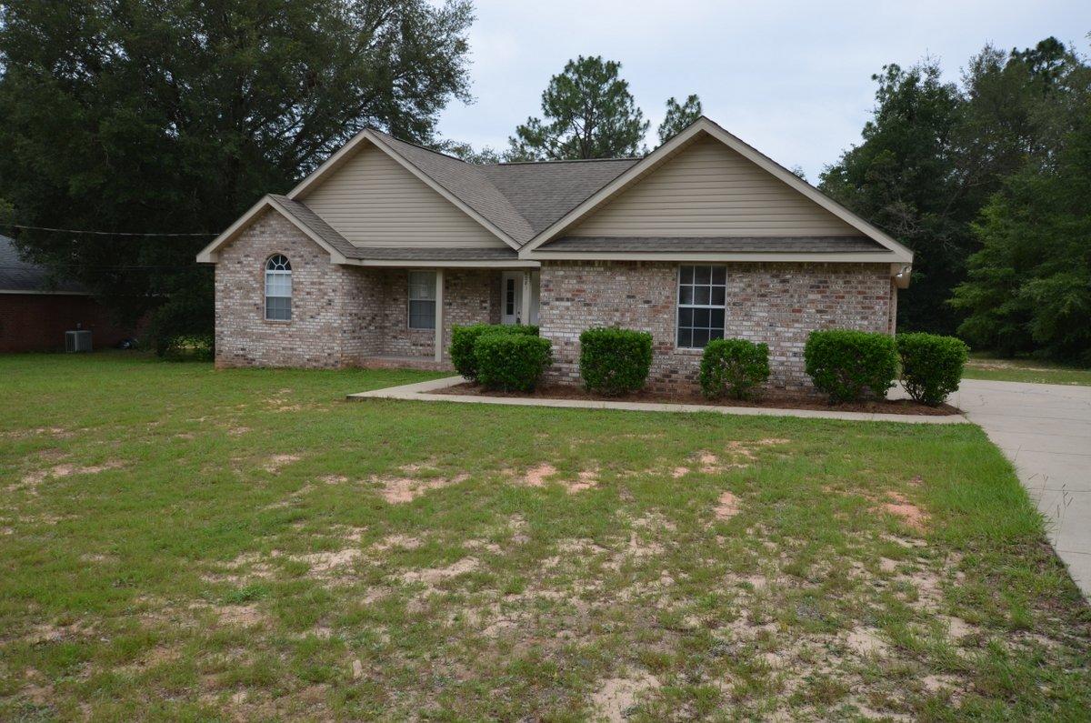 Welcome home to this conveniently country REO property. Home is just mins north of Hwy 90 in Milton off of Dogwood Rd and rests on .59 acres. Home has all brick exterior, vinyl trim, side entry garage and was built in 2006. Home has a split bedroom design with 3 bedrooms and 2 baths. Master bath has double vanities, garden tub and separate shower. The living space is nicely laid out with great room design with open kitchen, living room and dining areas. Home is super cute and located in an established neighborhood. A definite must see!