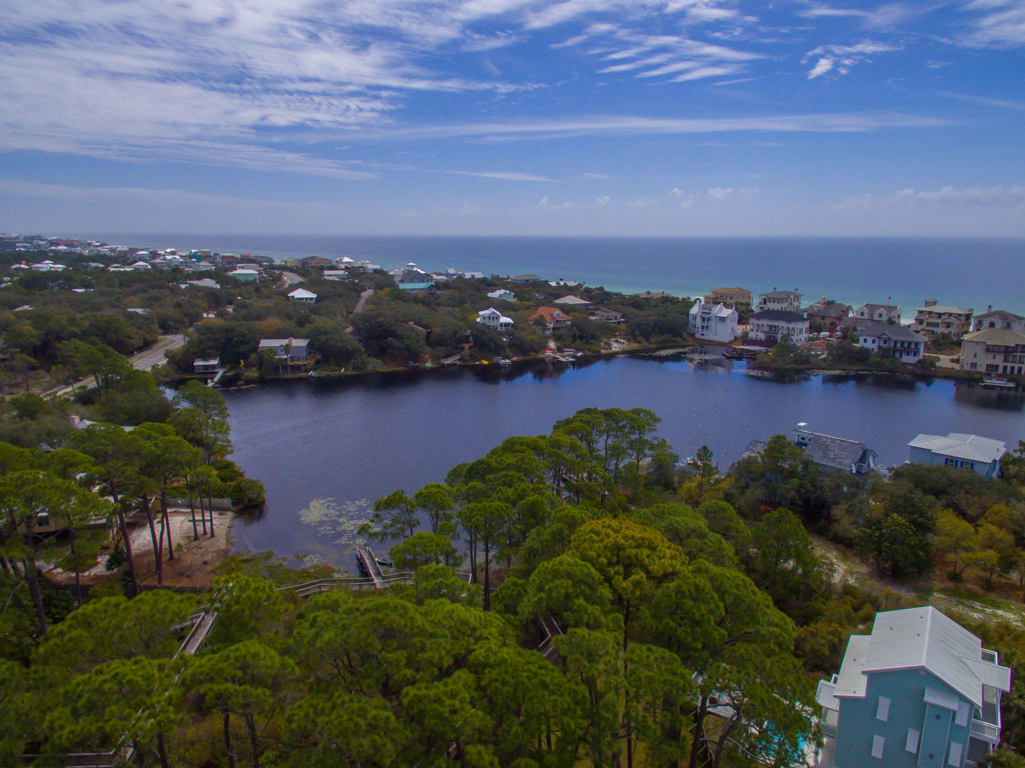 Located on West End of 30-A close proximity to Butler Elementary and The Gulf Place Entertainment and Shopping Center. Multiple beach access' within a short walk or stroll.Looking for lot to build your home? This lot has potential Gulf and Coastal Dune Lake views. Lot is 75x150 with No HOA or build out times. Street is quiet and private. Listing has feasibility study and survey attached. Small amount of wetlands on east side of property that should not interfere with build out plans. Lot 11 is also available for sale which would increase total acreage to over a 1/2 acre. Please see attached Feasibility Study, this document will answer a lot of questions regarding this lot. Lot has deeded access to nature trail and dock located on Stallworth Lake so you can paddleboard to Gulf