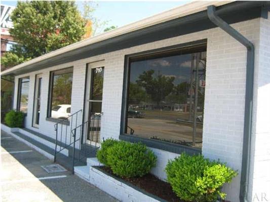 High Traffic Count. Great visibility on a good looking office building, which includes 6 office areas, a full kitchen with break area, and a full bath with shower. Spaces for easy client parking in the front and many more in the rear. Nice oak tree for shade in the back of parking lot, along with a bonus building for storage or could be a garage. Sign posts are high, large, include a marquee, and ready for your big logo for the world to see. Easy cleaning and maintenance. This is definitely the right place to get the exposure you need with a cost that is great. Perfect for an established business wanting to get more value for their money to increase profit. Pictures are from prior vacancy. Come take a look.