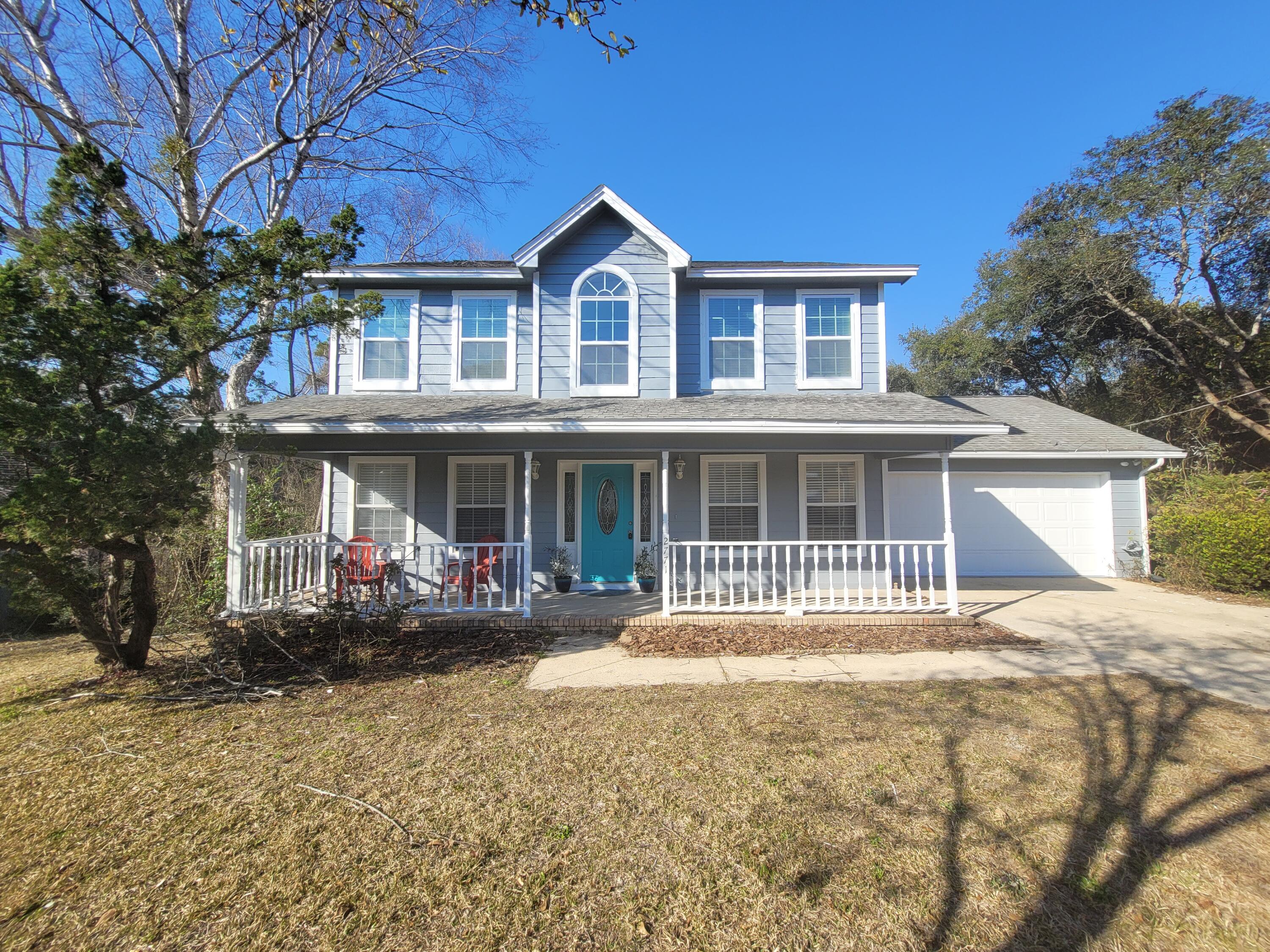 Welcome home! This one-of-a-kind two story stunner features a large inviting front porch. Beautiful two story open foyer, with a den on the left and a formal dining room on the right. Spacious kitchen. Cozy breakfast nook tucked away in a bay window. Large two car garage. Spacious living room with fireplace. Off of the living room is a large screened in florida room that over looks the HUGE fenced in back yard. Oversized deck off of the back makes entertaining a breeze. Half bath located off of the living room. Upstairs you will find three bedrooms and two full baths. The master bedroom is oversized and offers ample space for a king size bed. Master bath features a double vanity, soaker tub, walk-in shower and large closet. Fresh paint, new appliances, new carpet. NEW ROOF! (on order).