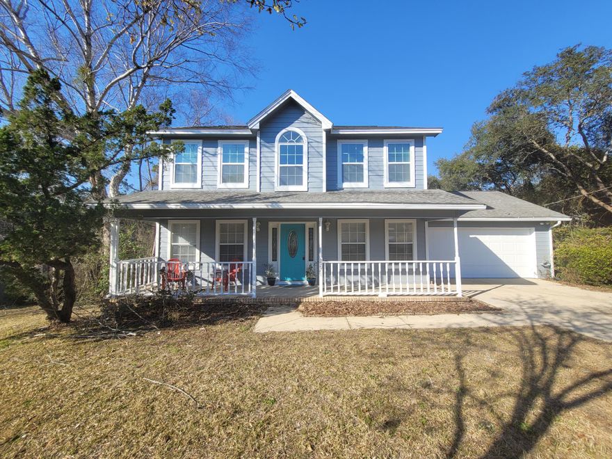 Welcome home! This one-of-a-kind two story stunner features a large inviting front porch. Beautiful two story open foyer, with a den on the left and a formal dining room on the right. Spacious kitchen. Cozy breakfast nook tucked away in a bay window. Large two car garage. Spacious living room with fireplace. Off of the living room is a large screened in florida room that over looks the HUGE fenced in back yard. Oversized deck off of the back makes entertaining a breeze. Half bath located off of the living room.  Upstairs you will find three bedrooms and two full baths. The master bedroom is oversized and offers ample space for a king size bed. Master bath features a double vanity, soaker tub, walk-in shower and large closet. Fresh paint, new appliances, new carpet. NEW ROOF! (on order).
